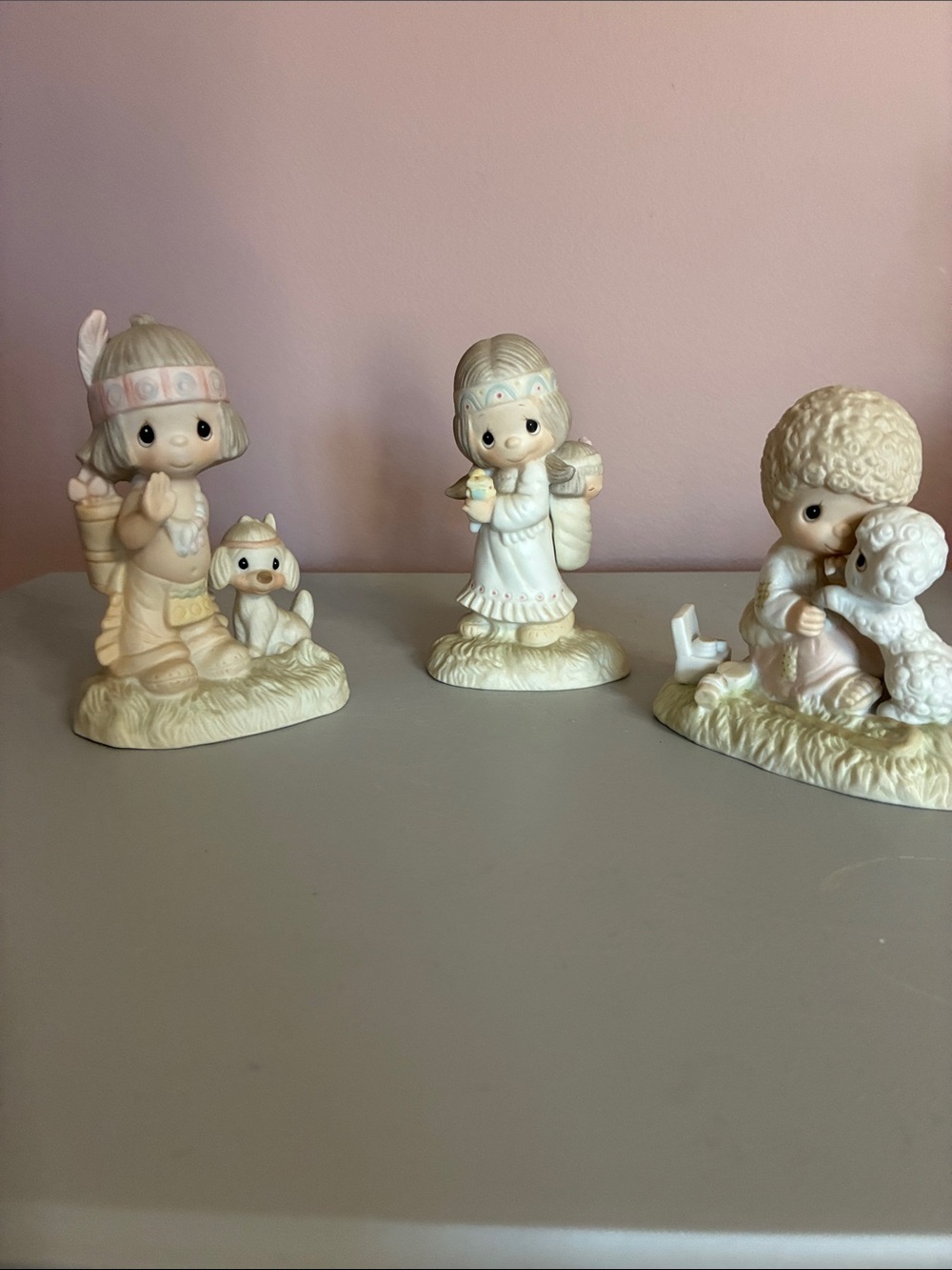 Precious Moments Cream Figurine Trio with Pink and Light Blue Accents